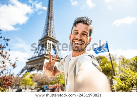 Similar – Image, Stock Photo Male tourist with photo camera standing on rocky lake shore