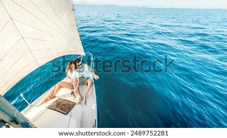 Similar – Image, Stock Photo Catamaran on the beach on a sunny day