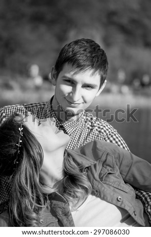 young couple in love on the lake, black and white