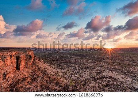 Similar – Image, Stock Photo Beautiful sunrise at Damaraland, Namibia. Group of people seen from their back walking up a mountain.