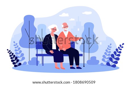 Happy senior couple relaxing in park, sitting on bench, holding hands. Old man with cane and woman enjoying leisure time outdoors. For elderly age, retirement, relationship concept