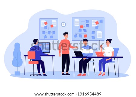 Team of programmers developing software, working on app in office interior. Group leader or coach giving lesson to employees at note boards. For programming, coding, mentorship concept