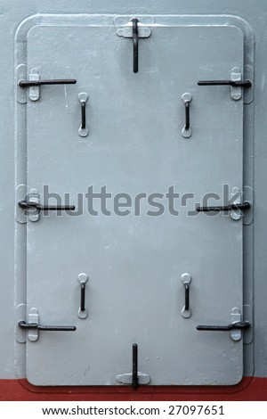 Gray Metal protective door with black handle