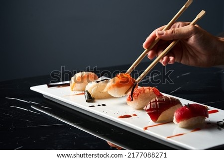 Similar – Image, Stock Photo Table with sushi in restaurant