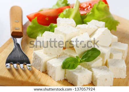 Feta cheese served with fresh vegetables