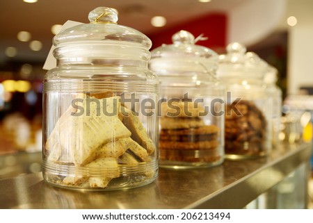 Cookies in Jars for sale on cafe counter top