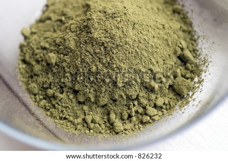 Close up of raw Henna powder used for natural color dyeing