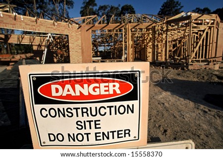 Danger Sign posted at entrance to housing construction site