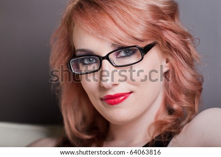Beautiful female wearing black rim glasses