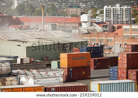 HOBART,Australia - March 20: Fire Brigade units attend a warehouse fire in a shipping container yard March 20, 2012 in Hobart, Tasmania