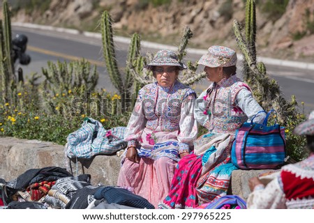 19 APR 2015 : Local Peruvian try to sell Handicraft\'s product at Condor watching, Colca Canyon, Arequipa, Peru