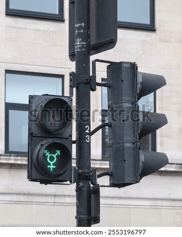 Similar – Image, Stock Photo LGBT pedestrian traffic light signals symbolizing equality