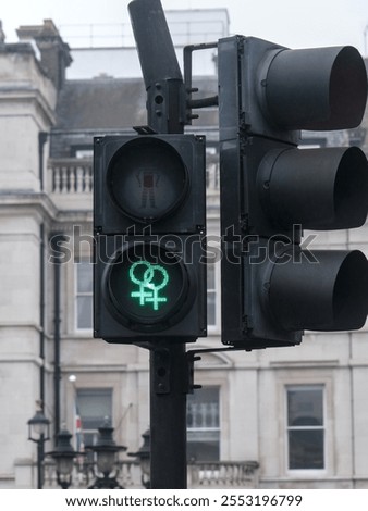 Similar – Image, Stock Photo LGBT pedestrian traffic light signals symbolizing equality