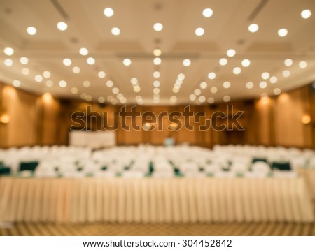 Abstract blurred the empty meeting or conference room for background.