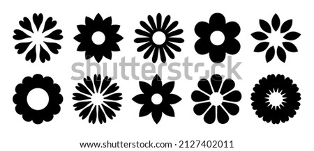 Flower icons. Flower silhouettes. Symbol of floral design. Pattern of daisy, rose and chamomile. Set of cartoon simple graphic shape isolated on white background. Vector.