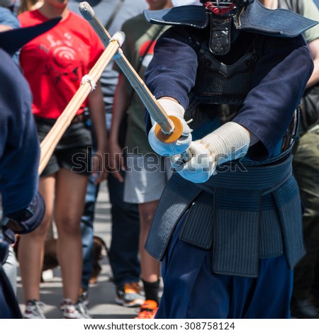Kendo Fighters match in Traditional Clothes and Bamboo Sword, Japanese Martial Art