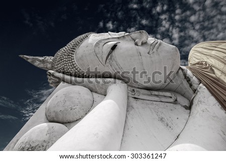 Big Buddha Statue with blue sky in Thai Temple, Thailand. (Black and White)