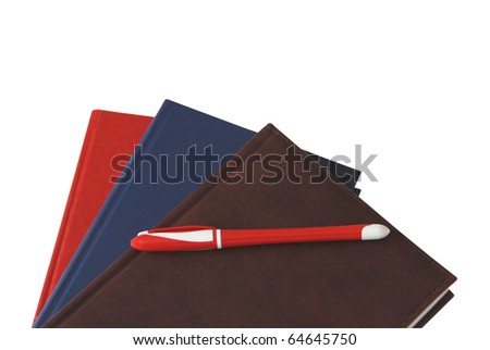 Pen and notebooks on white background