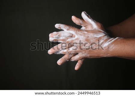 Image, Stock Photo doctor man washing hands with disinfectant soap. Hygiene and Corona virus Covid-19 concept