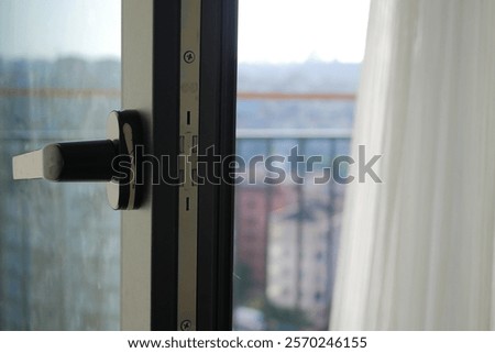 Similar – Image, Stock Photo Minimalist balcony door with shiny knob