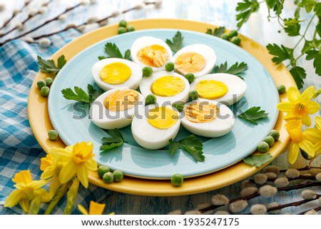 Image, Stock Photo Easter dinner with eggs on a light table