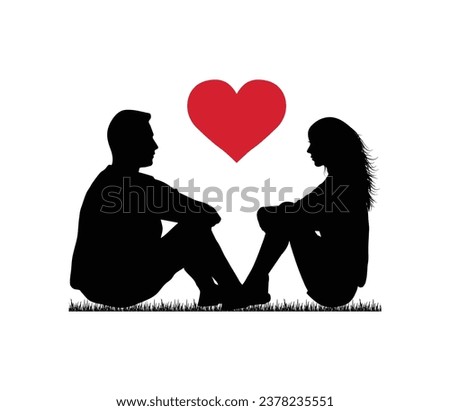A couple in love and face to face sitting on the grass field