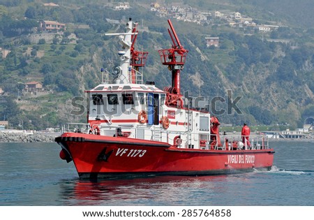 Genoa, Italy - may 20, 2014 - A patrol boat of the fire moves in the sea of Arenzano, near the spot where the wreck of the tanker Haven.