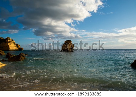 Similar – Image, Stock Photo Rocky formations near still lake