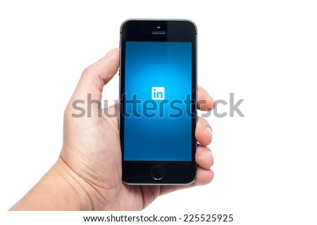 Pavlograd, Ukraine - OCTOBER 21, 2014: LinkedIn app on iphone 5S. LinkedIn is largest social network for business communication in the world
