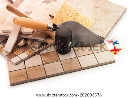 Tiles, trowel, rubber mallet, sponge, crosses