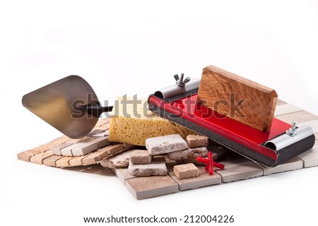 Tiles made of stone and marble, a device for grinding walls, sponge, trowel