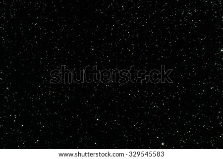 Abstract dark glitter lights texture or background.