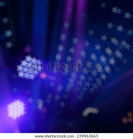 Stars background. Blurred background nightclub spotlight on disco. Disco lights in the shape of a star. Blur background in the form of stars