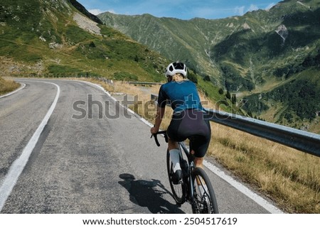 Similar – Image, Stock Photo Female cyclist in helmet practicing on training track