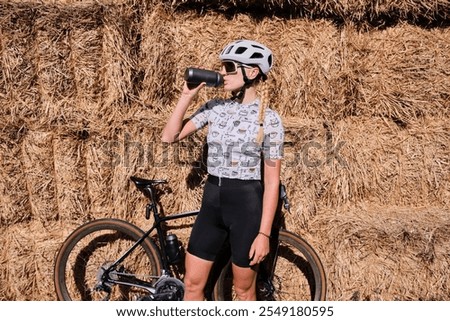 Similar – Foto Bild Junge Radfahrerin macht pause