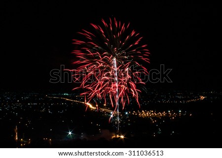 Mothers Day Colorful fireworks celebration on the black sky background in the city Chiang mai, Thailand