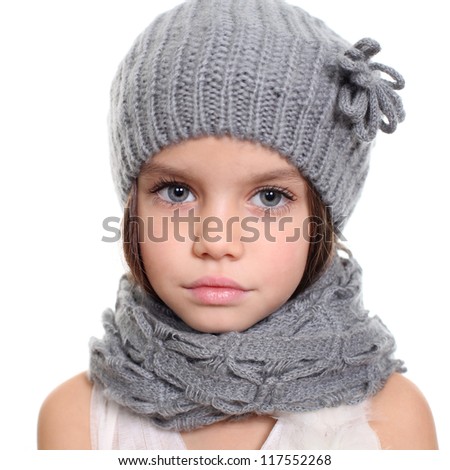 Little Girl In A Knitted Hat And Gray Scarf Stock Photo 117552268 ...
