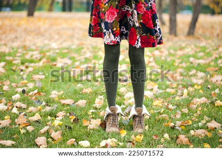 Female wool tights and autumn shoes - body part