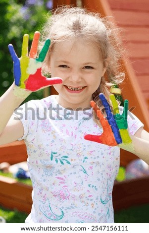 Similar – Image, Stock Photo Funny girl showing dirty hands