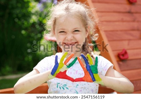 Similar – Image, Stock Photo Funny girl showing dirty hands