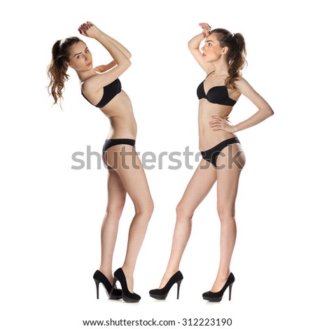 Snap Models. Full length portrait of a beautiful brunette women in black bikini isolated on white background