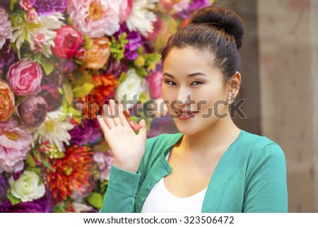 Portrait of a beautiful asian young woman in the store