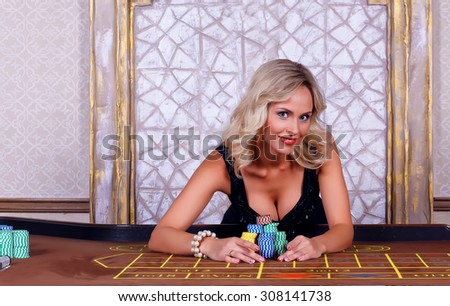 Girl playing in casino.woman in a casino