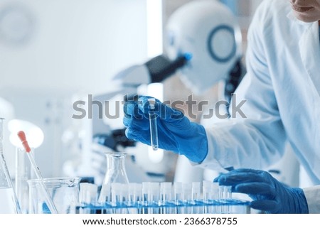 Similar – Image, Stock Photo Vials with scientific samples arranged on glass table