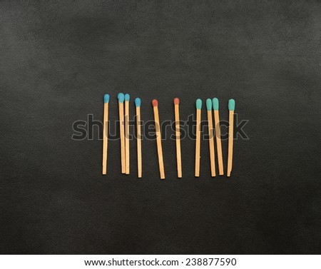 match sticks on black background