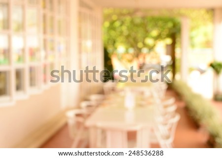 blur white decoration dinner restaurant interior and garden background