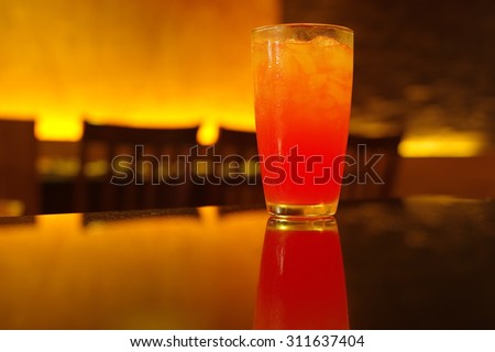 cold pink drink at night