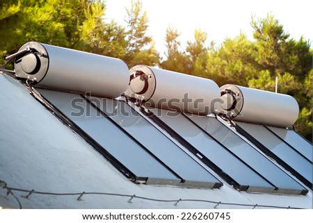 solar panels and boilers for alternative water heating