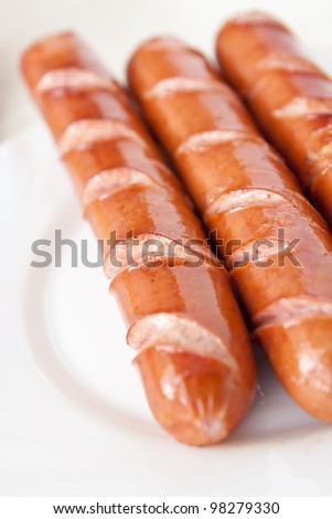 frankfurter sausage hot dog food at plate