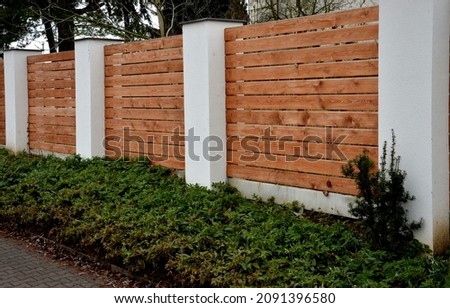 Similar – Image, Stock Photo Brick columns and facade of an university building in the afternoon